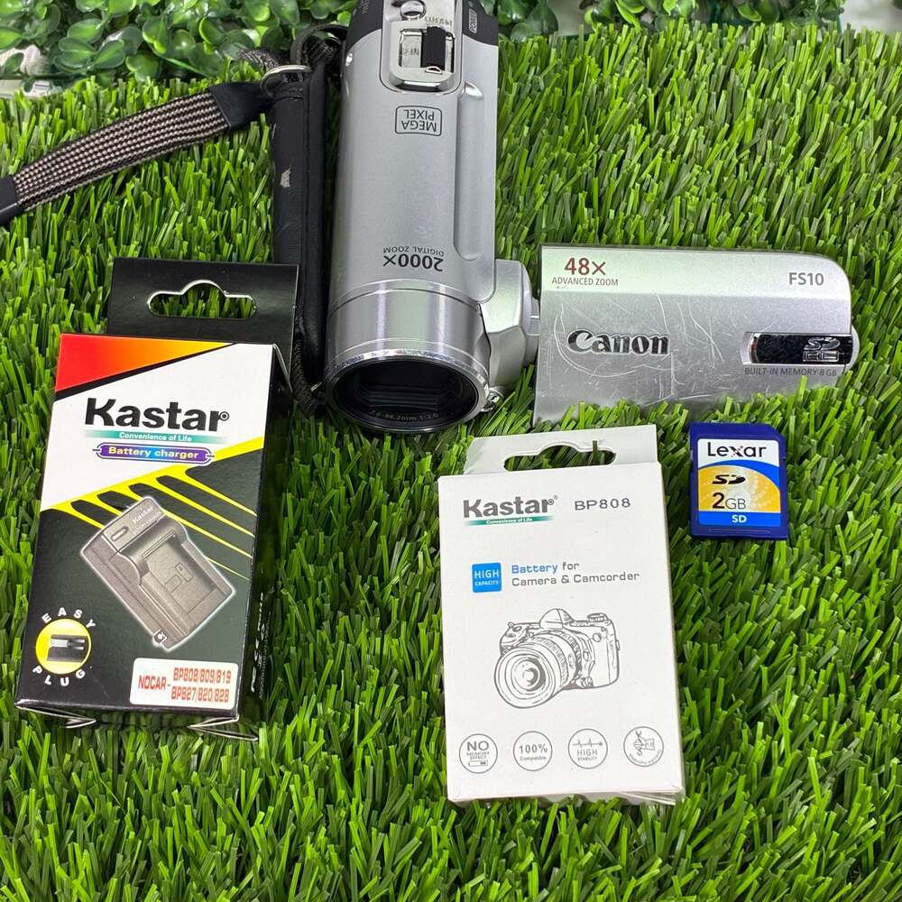 Canon FS10A Flash Memory Camcorder with 8GB Internal Memory. Battery +Charger+Sd